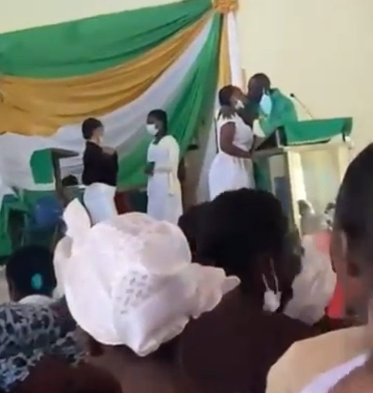 Anglican Priest Kissing 3 Female Students On The Altar (Video)